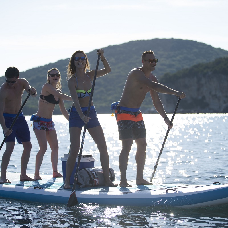 paddle board and windsurf with friends